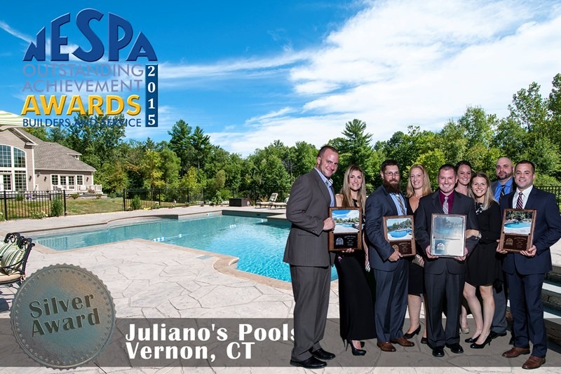 This is a picture of Julianao's Pools being awarded the NESPA outstanding achievement award