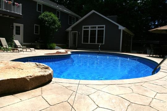 This is a kidney shape new pool construction in Stockbridge, MA